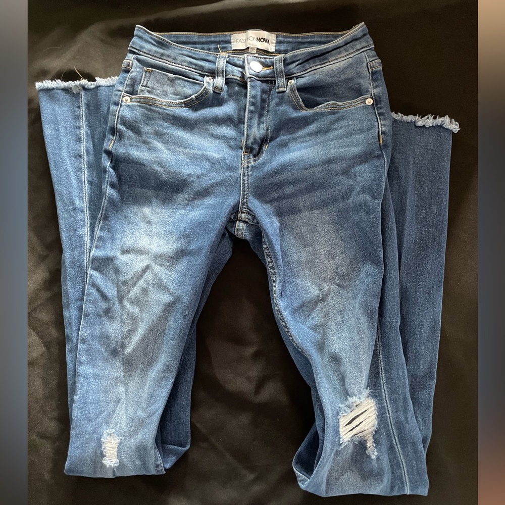 Flared mid rise fashion nova jeans